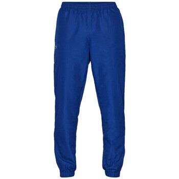 Pantalon Lacoste PANTALON DE SURVÊTEMENT UNI SPORT BLEU EN TISSU LÉGE