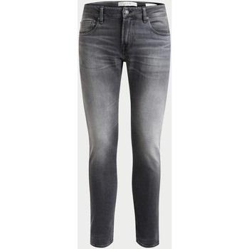 Jeans Guess jean skinny pour homme en coton mélangé