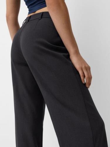 Pantalon à plis