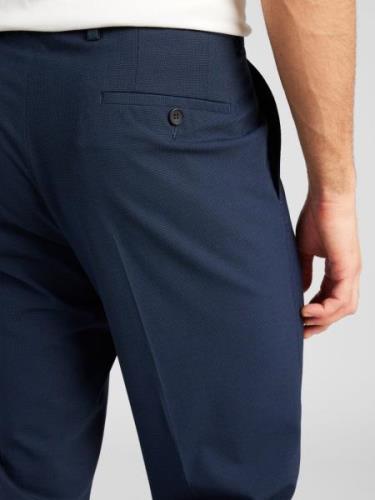 Pantalon à plis