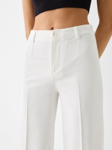 Pantalon à plis