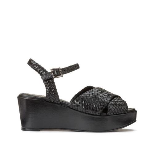 Sandalen in leer met sleehak